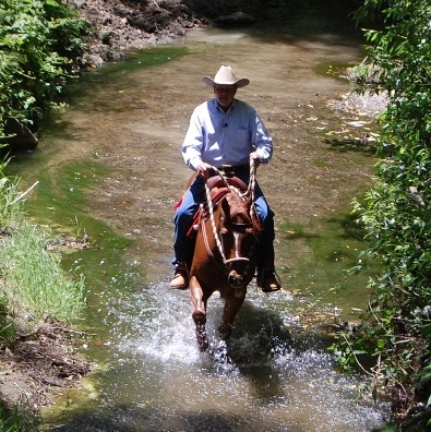 Charles Wilhelm riding at Trail Creek